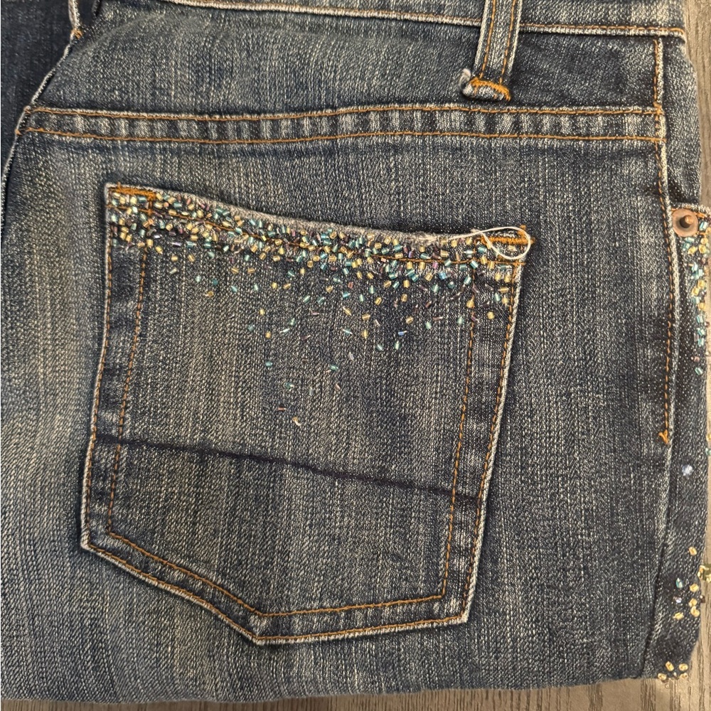 Arden B denim with colored crystals on the back and front pockets.